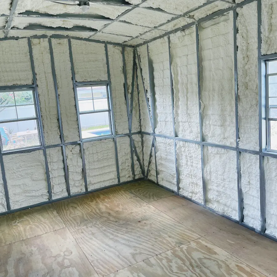 Closed-cell spray foam insulation applied to wall cavities in a residential project in New Castle